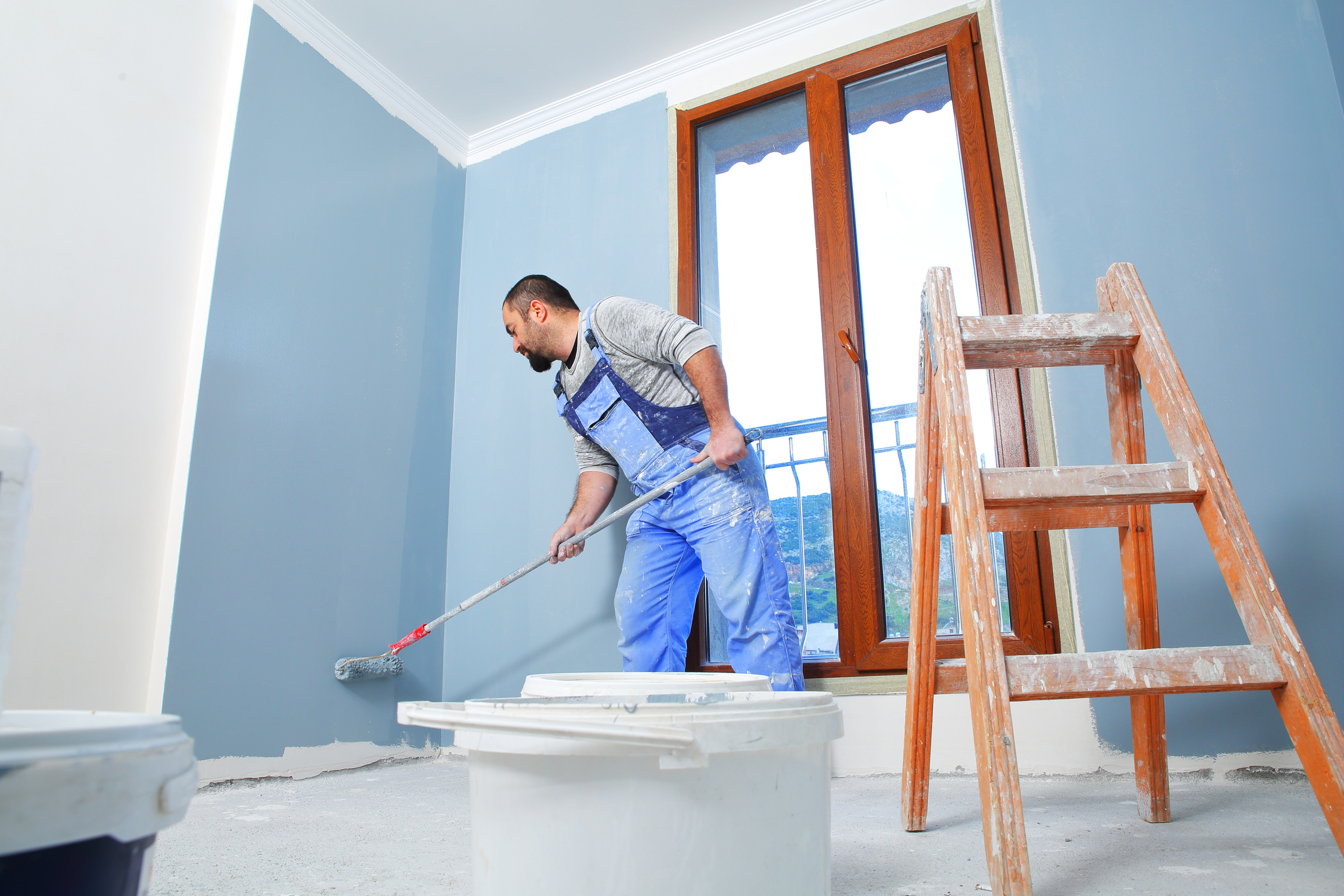 Painter man at work